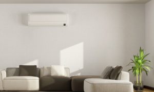 living room with sofa and air conditioner PNPV4G4 e1558687166338